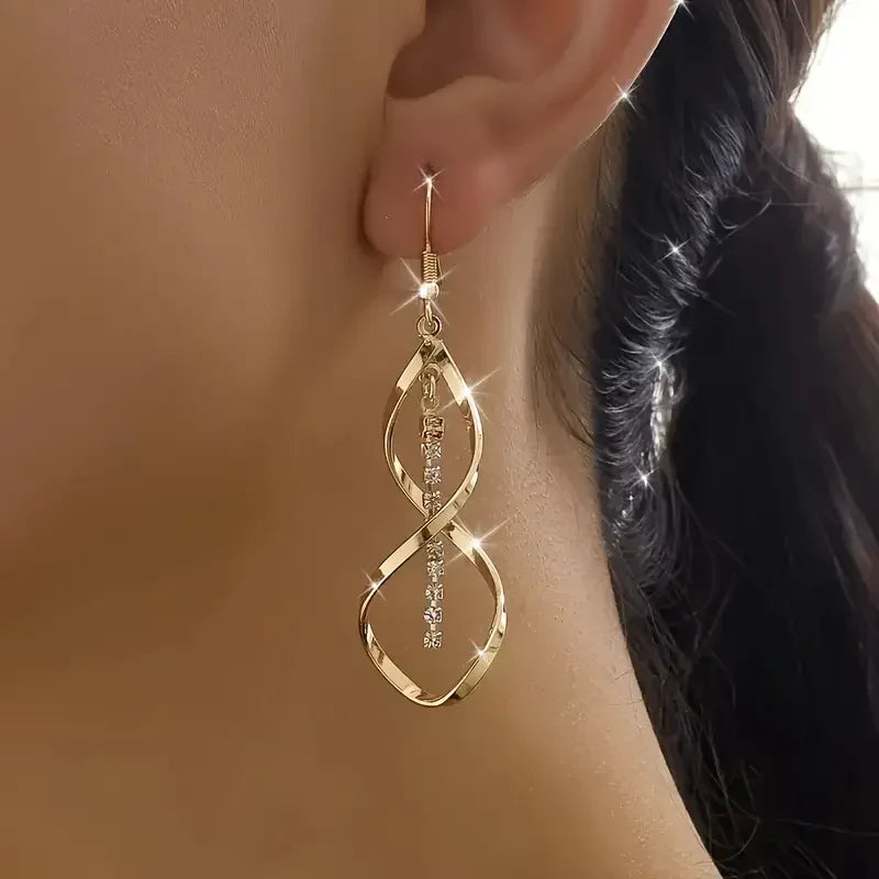 Solara | Gold Spiral Earrings